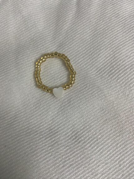 Golden beaded heart charm ring