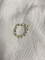 White n golden beaded ring