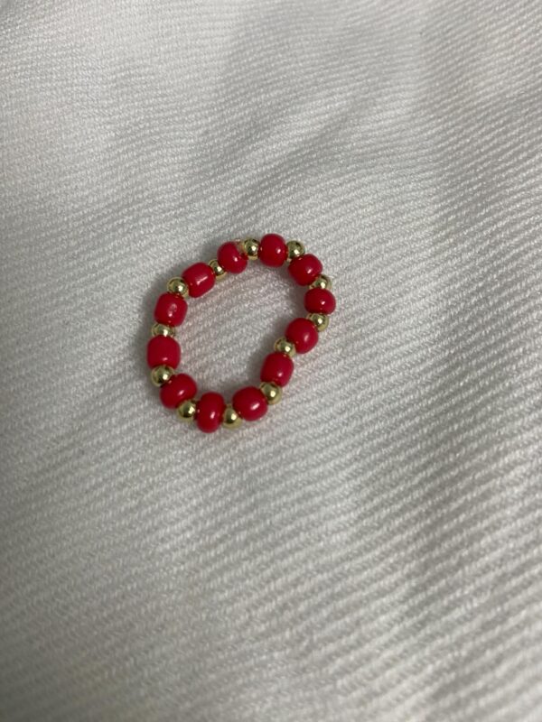 Red n golden beaded ring