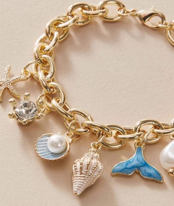 Star fish and fish tail charm premium bracelet