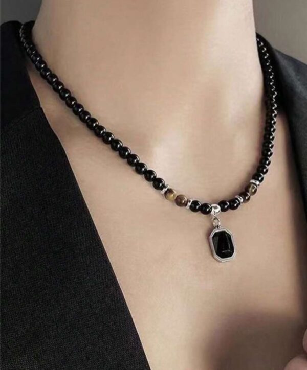 Tiger stone beaded necklace with black stone pendant