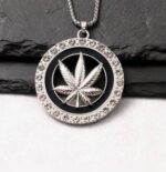 Rhinestone studded hollow leaf pendant necklace