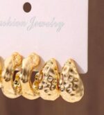 Golden textured C design earrings