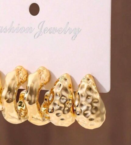 Golden textured C design earrings