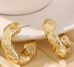 Golden textured C design earrings