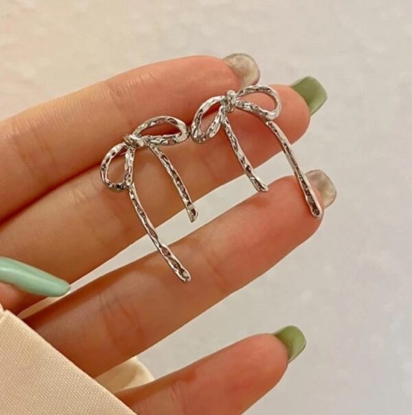 Bow silver stud earrings