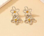 Metallic petal shaped linked pendant earrings