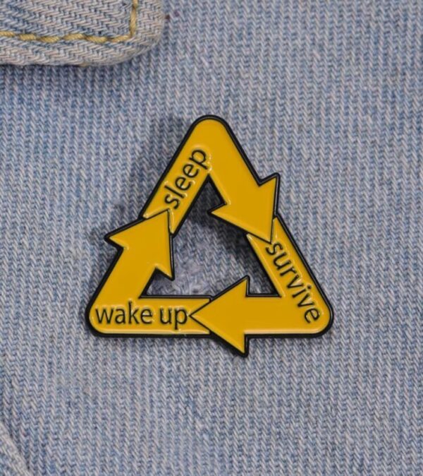 Day cycle brooch pin badge